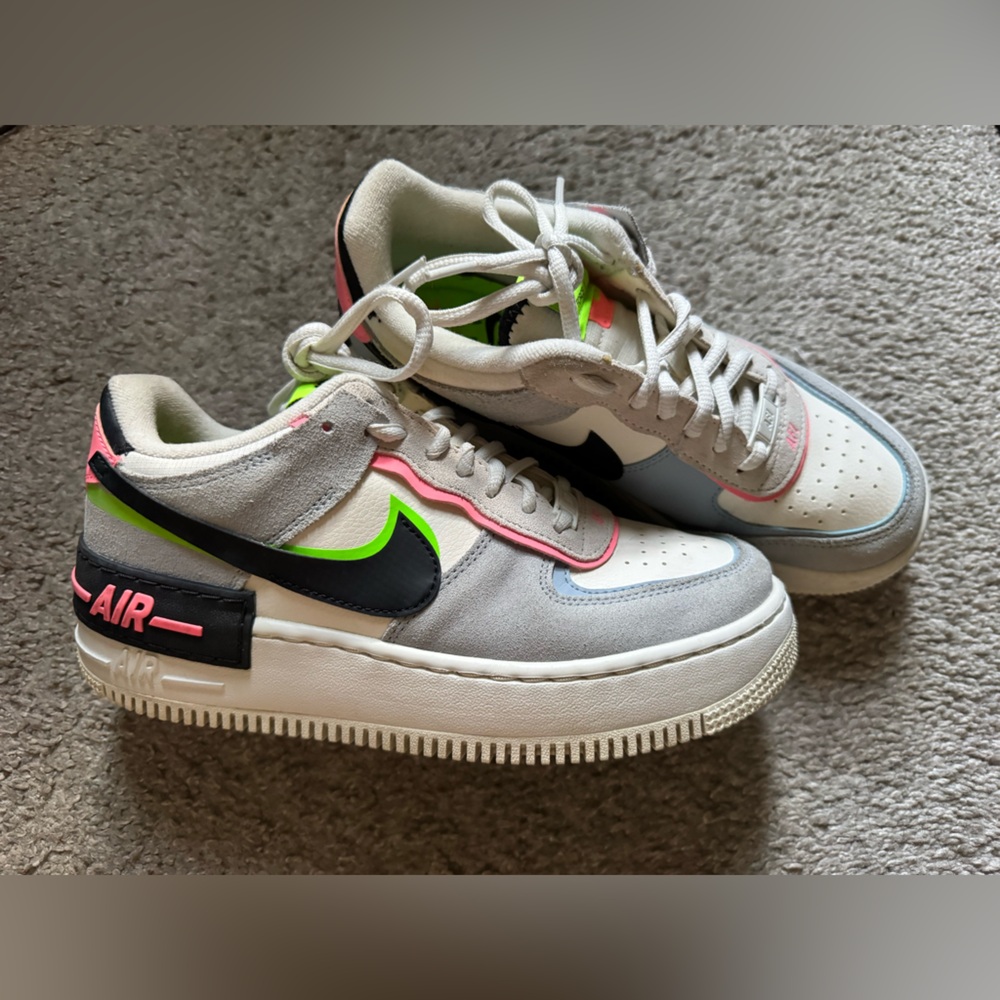 Nike Air Force 1s in White, Gray, Black with Neon Green and Pink Accents